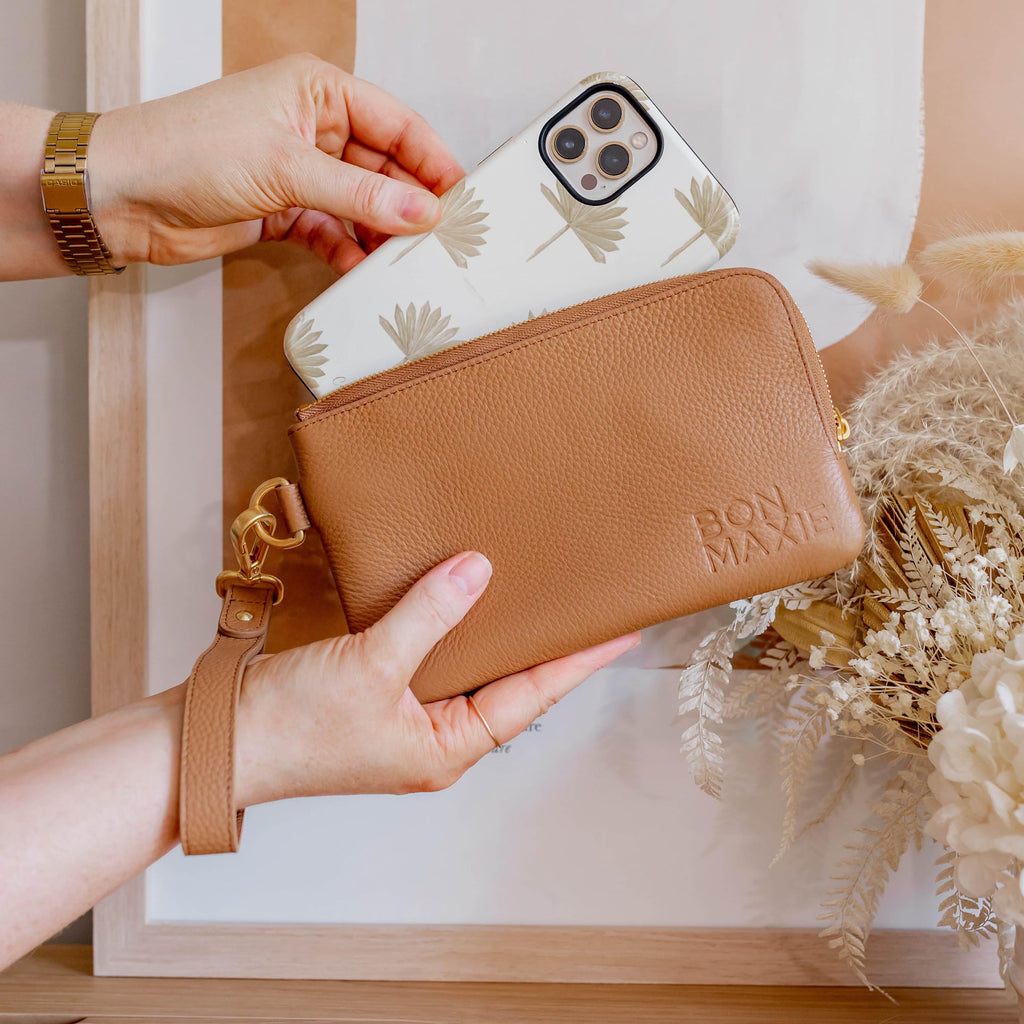 SHOP WALLETS + POUCHES